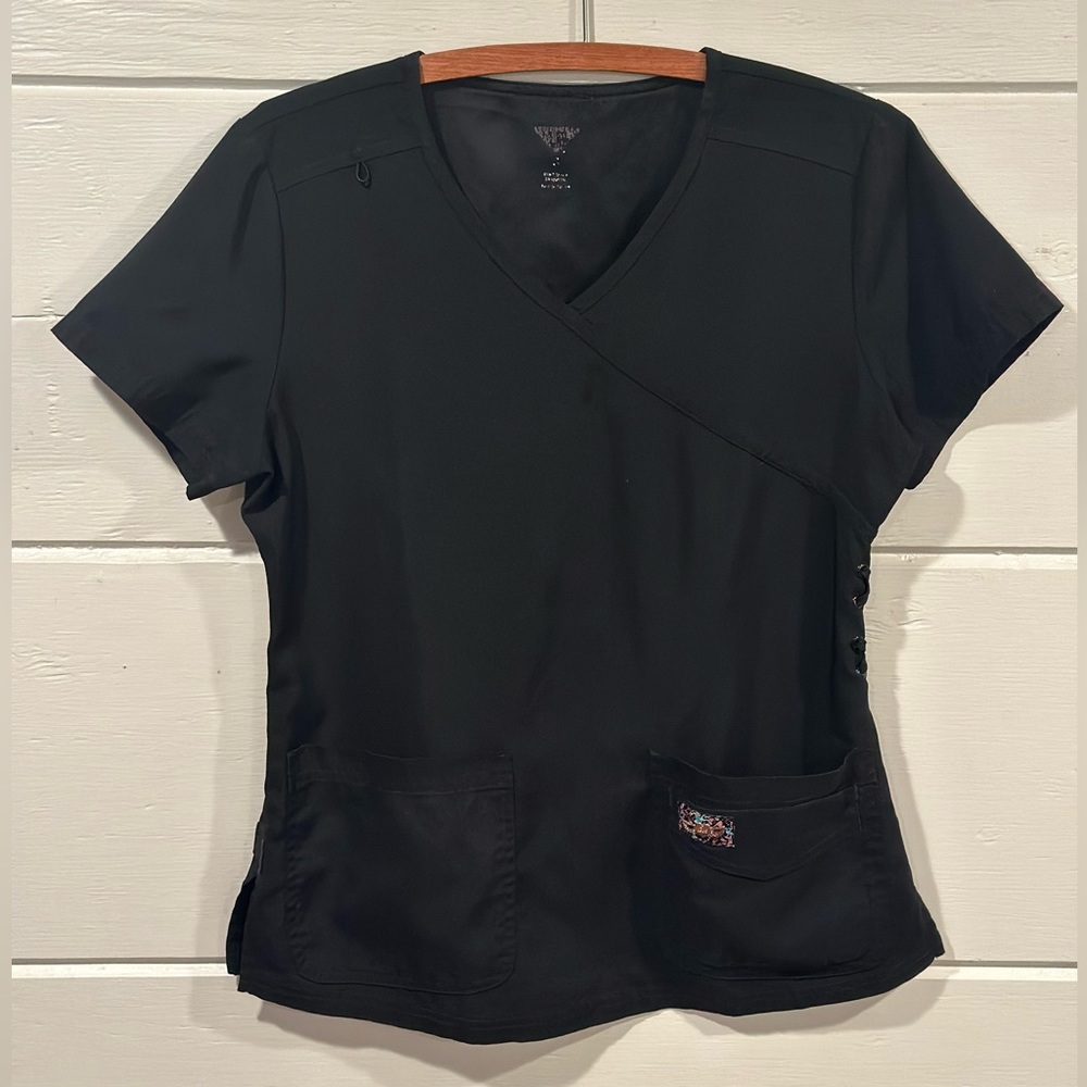 Two women’s koi scrub tops